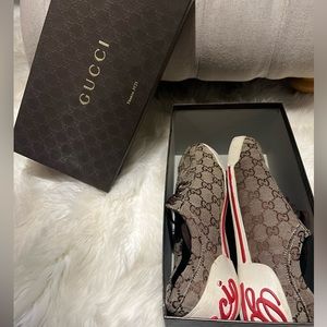 Tan/gold leather Gucci script logo sneakers! Gucci script at the back.
